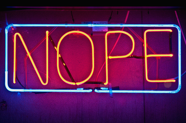 neon sign: "NOPE"
