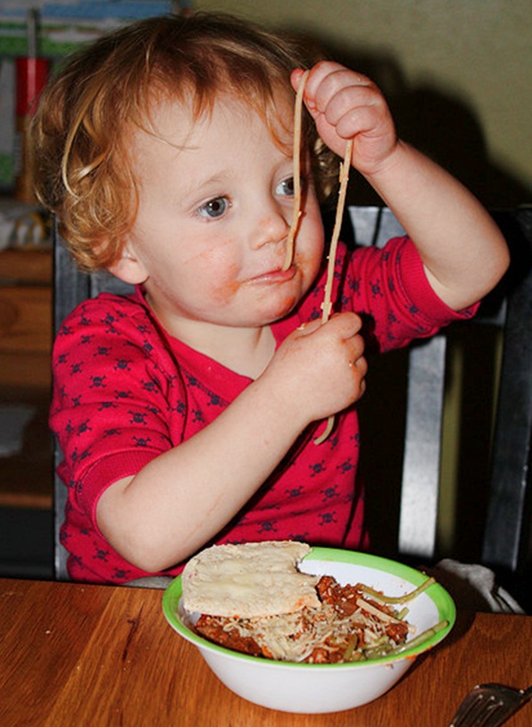 Kid Eating Spaghetti