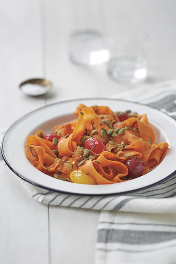 In this dish, the “fettuccine” is actually made from carrots shredded into ribbons with a vegetable peeler. I think you’ll be surprised at how much it tastes like the real thing.